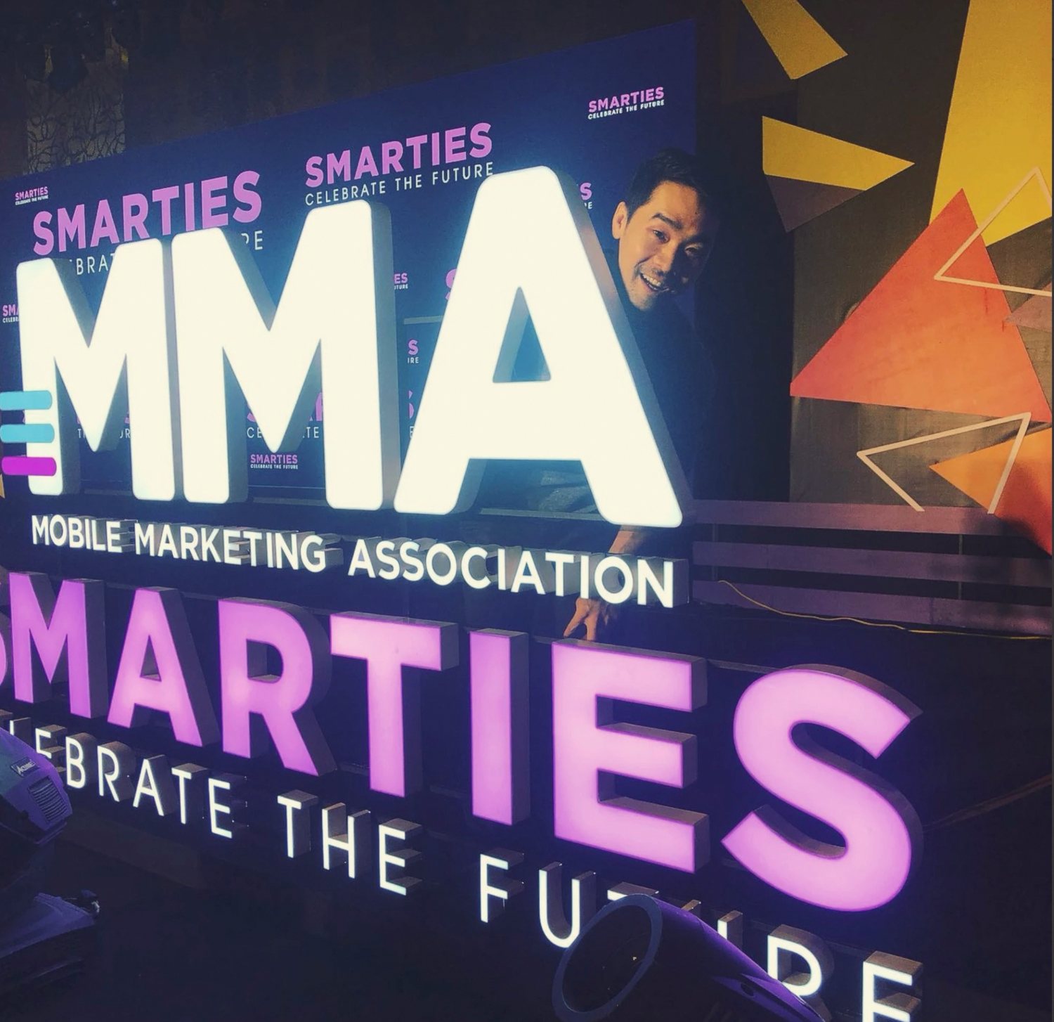 Ly at the MMA Smarties awards sign